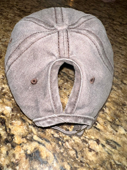 Brown cap with black bow